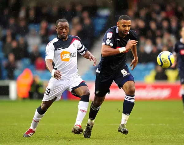 Millwall vs. Bolton Wanderers: Fifth Round FA Cup Clash - Intense Battle Between Nigel Reo-Coker and Liam Trotter