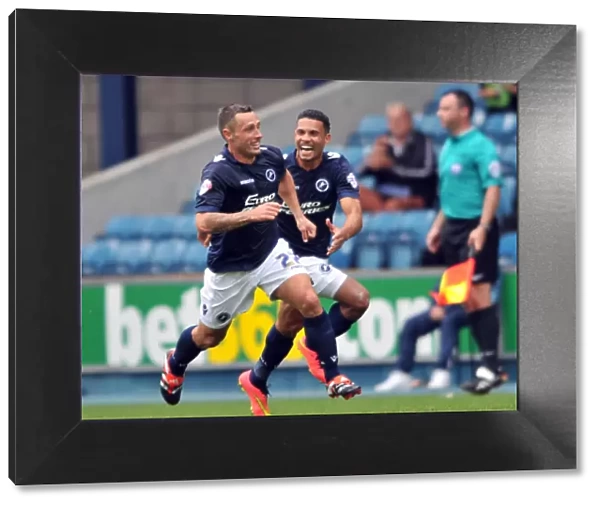 Scott McDonald Scores First Goal for Millwall: Jubilant Celebration with Team Mates against Blackpool in Sky Bet Championship Match
