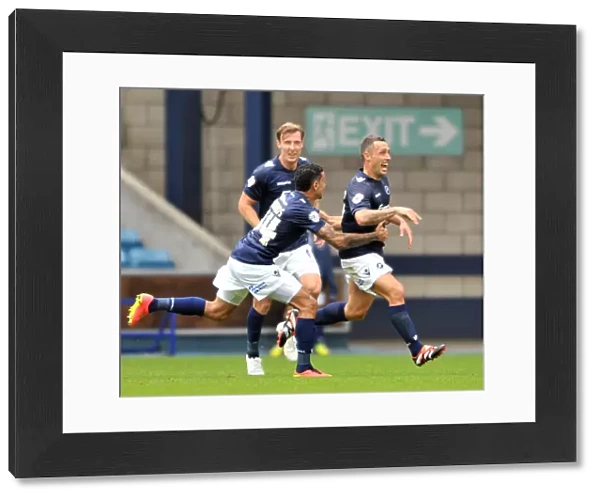 Scott McDonald's Thrilling Debut Goal for Millwall: A Jubilant Celebration with Team Mates at The Den (Millwall vs Blackpool, Sky Bet Championship)
