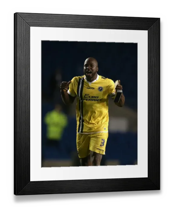 Framed Print : Millwall's Triumph: Danny Shittu Celebrates Sky Bet Championship Victory over Brighton & Hove Albion Framed Print : Millwall's Triumph: Danny Shittu Celebrates Sky Bet Championship Victory over Brighton & Hove Albion