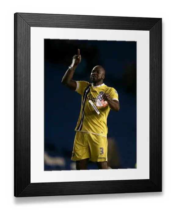 Framed Print : Millwall's Championship Glory: Danny Shittu's Triumphant Celebration vs. Brighton & Hove Albion