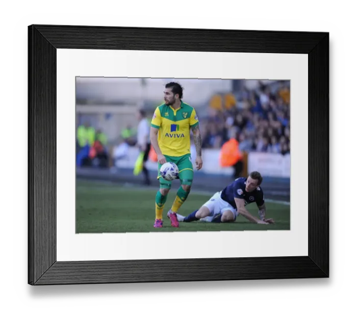 Framed Print : Battle at The Den: A Fierce Clash Between Millwall and Norwich City in the Sky Bet Championship Framed Print : Battle at The Den: A Fierce Clash Between Millwall and Norwich City in the Sky Bet Championship