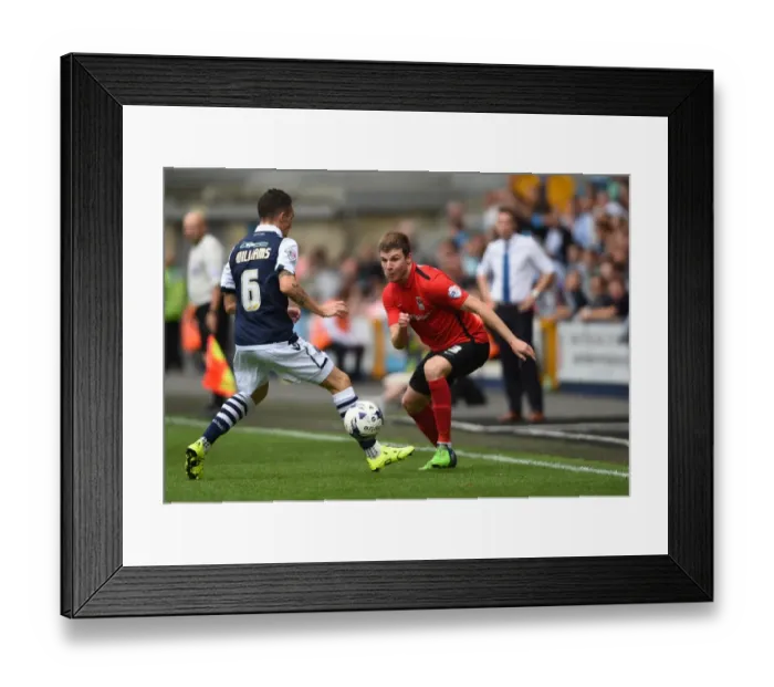 Framed Print : Millwall vs Coventry City: A Fierce Battle in Sky Bet League One at The New Den - Williams vs Stokes