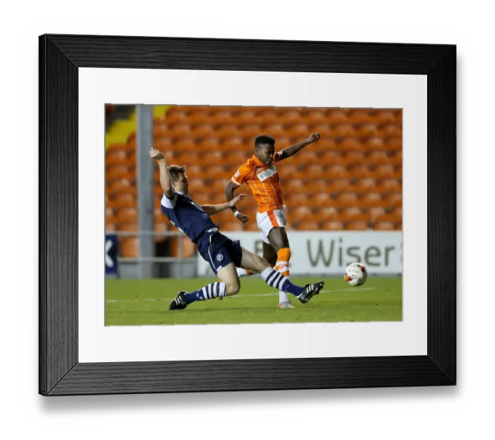 Framed Print : Intense Rivalry: Osayi-Samuel vs. Craig in Sky Bet League One Clash at Bloomfield Road Framed Print : Intense Rivalry: Osayi-Samuel vs. Craig in Sky Bet League One Clash at Bloomfield Road
