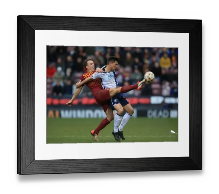 Framed Print : Battle for the Ball: Tony McMahon vs. Joe Martin in Sky Bet League One Clash between Bradford City and Millwall Framed Print : Battle for the Ball: Tony McMahon vs. Joe Martin in Sky Bet League One Clash between Bradford City and Millwall