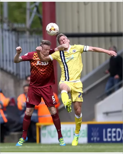 Battle for Supremacy: Morison vs. Clarke in Millwall's Play-Off Clash with Bradford City