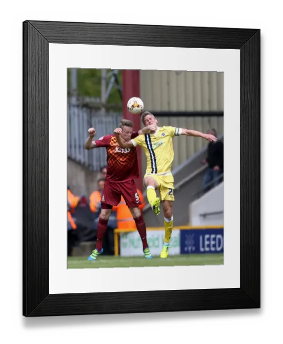 Framed Print : Battle for Supremacy: Morison vs. Clarke in Millwall's Play-Off Clash with Bradford City Framed Print : Battle for Supremacy: Morison vs. Clarke in Millwall's Play-Off Clash with Bradford City