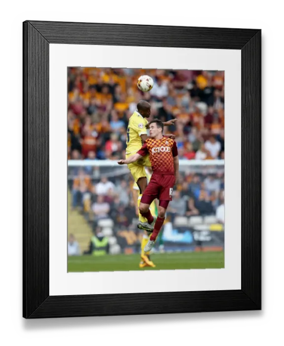 Framed Print : Millwall vs. Bradford City: Nadjim Abdou vs. Josh Cullen - Intense Aerial Battle in the 2015-16 Sky Bet League One Play-Offs
