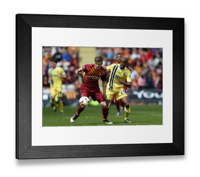 Framed Print : Intense Rivalry: Evans vs Abdou Battle for League One Play-Off Supremacy Framed Print : Intense Rivalry: Evans vs Abdou Battle for League One Play-Off Supremacy