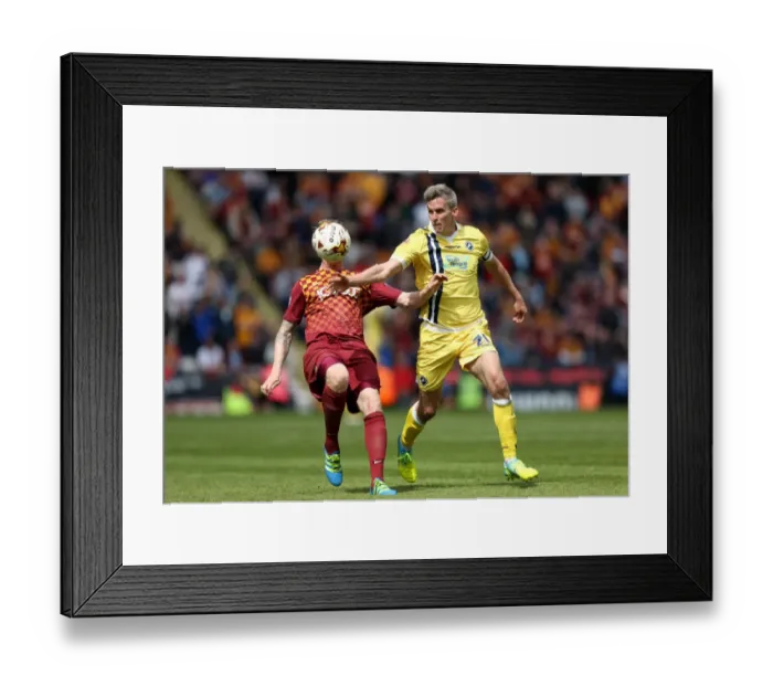 Framed Print : Bradford City vs. Millwall: Intense Rivalry - Nathan Clarke vs. Steve Morison in the Play-Off First Leg Framed Print : Bradford City vs. Millwall: Intense Rivalry - Nathan Clarke vs. Steve Morison in the Play-Off First Leg