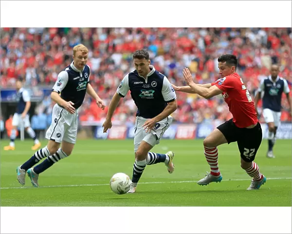 Intense Rivalry: Battle for the Ball - Millwall vs Barnsley in the Sky Bet League One Play-Off Final at Wembley Stadium (2015-16)
