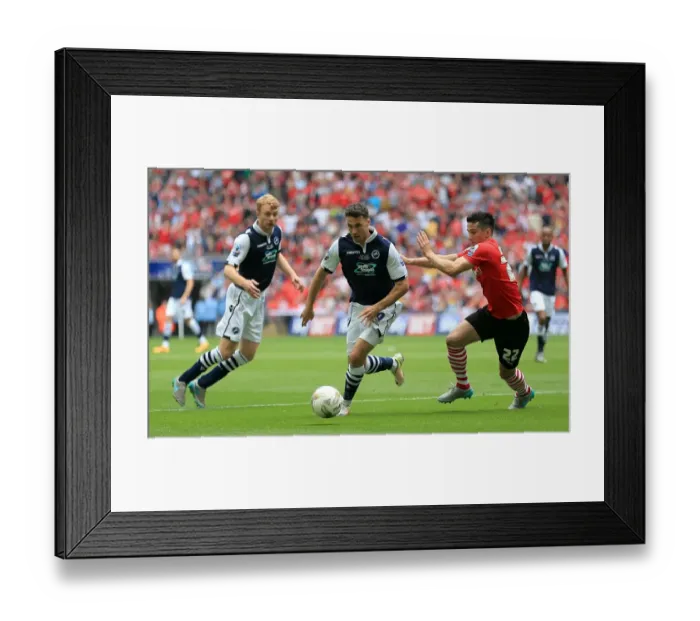 Framed Print : Intense Rivalry: Battle for the Ball - Millwall vs Barnsley in the Sky Bet League One Play-Off Final at Wembley Stadium (2015-16) Framed Print : Intense Rivalry: Battle for the Ball - Millwall vs Barnsley in the Sky Bet League One Play-Off Final at Wembley Stadium (2015-16)