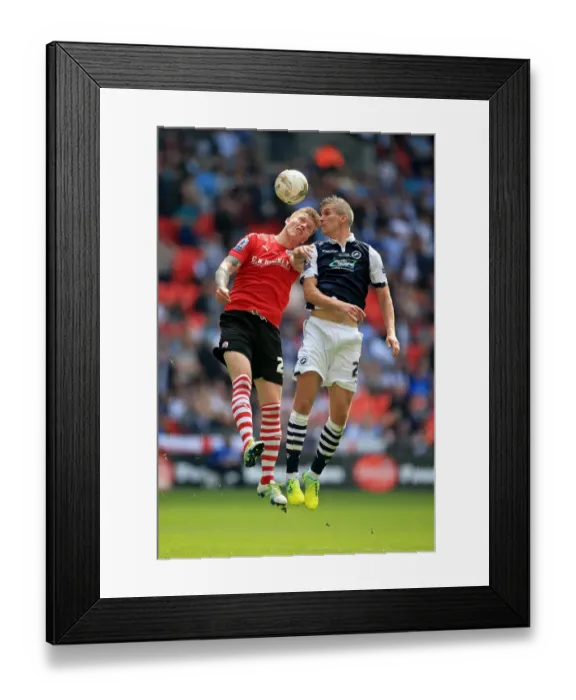 Framed Print : Barnsley vs. Millwall: Intense Rivalry in the Sky Bet League One Play-Off Final at Wembley Stadium - Alfie Mawson vs. Steve Morison's Battle for Supremacy Framed Print : Barnsley vs. Millwall: Intense Rivalry in the Sky Bet League One Play-Off Final at Wembley Stadium - Alfie Mawson vs. Steve Morison's Battle for Supremacy