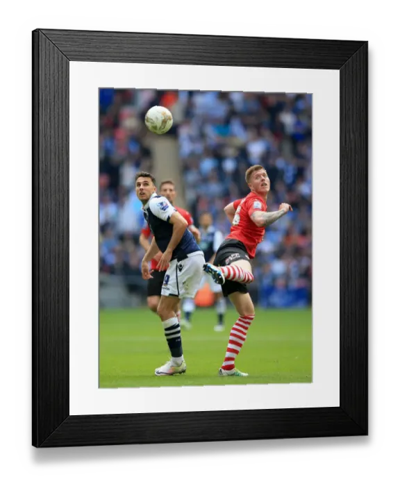 Framed Print : Barnsley vs Millwall - Play-Off Final Showdown: Alfie Mawson vs Lee Gregory at Wembley Stadium Framed Print : Barnsley vs Millwall - Play-Off Final Showdown: Alfie Mawson vs Lee Gregory at Wembley Stadium