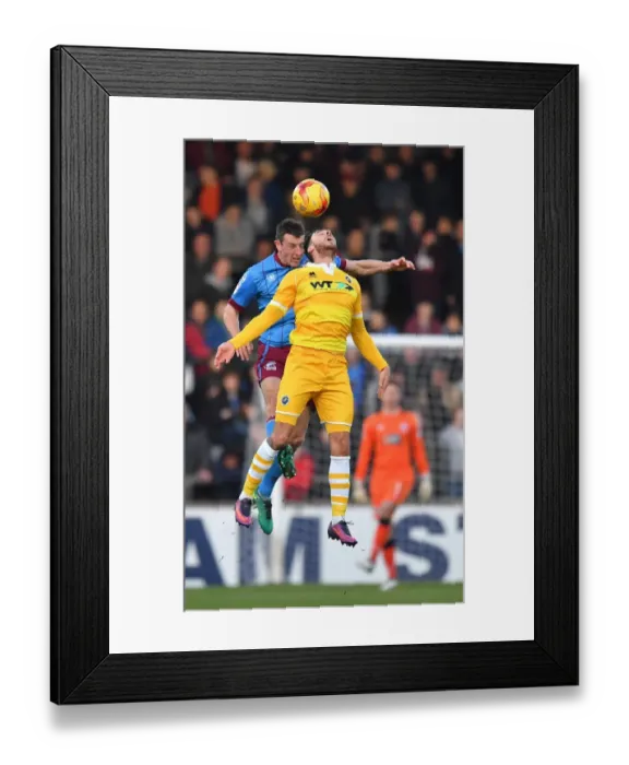 Framed Print : Scunthorpe United vs Millwall: Intense Battle Between Charlie Goode and Lee Gregory Framed Print : Scunthorpe United vs Millwall: Intense Battle Between Charlie Goode and Lee Gregory