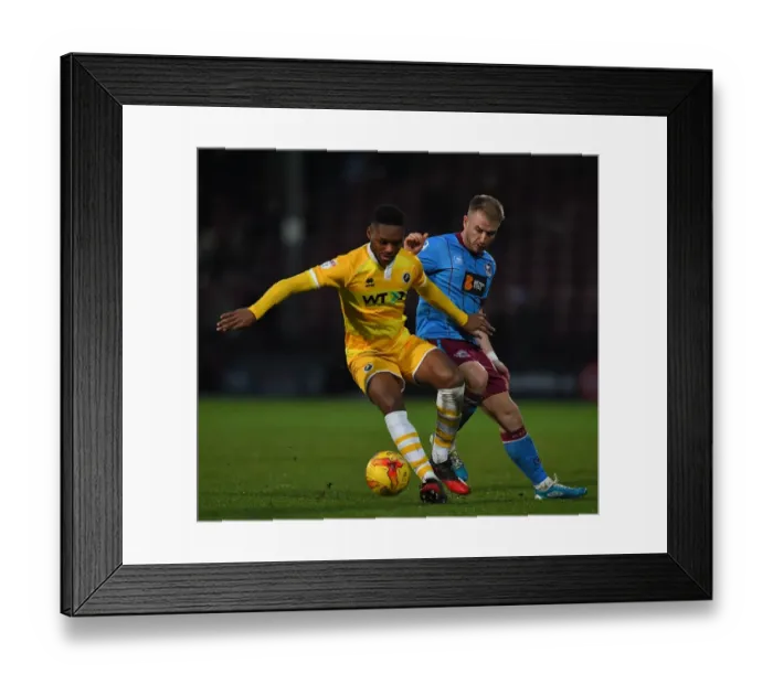 Framed Print : Intense Rivalry: Paddy Madden vs Byron Webster Battle at Glanford Park (Millwall vs Scunthorpe United, Sky Bet League One) Framed Print : Intense Rivalry: Paddy Madden vs Byron Webster Battle at Glanford Park (Millwall vs Scunthorpe United, Sky Bet League One)