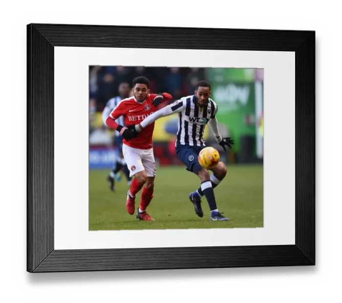 Framed Print : Charlton Athletic vs Millwall: Intense Battle Between Jay Dasilva and Shaun Cummings at The Valley Framed Print : Charlton Athletic vs Millwall: Intense Battle Between Jay Dasilva and Shaun Cummings at The Valley