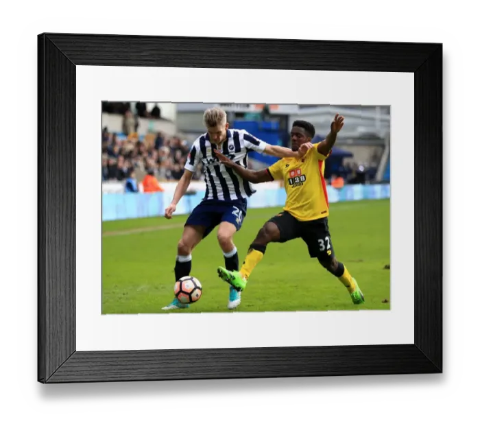 Framed Print : Millwall vs. Watford: Intense Battle for the Ball in FA Cup Fourth Round at The Den Framed Print : Millwall vs. Watford: Intense Battle for the Ball in FA Cup Fourth Round at The Den