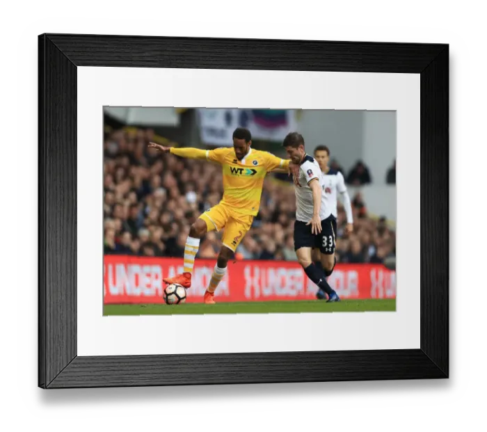 Framed Print : Intense Rivalry: Davies vs. Cummings in the Emirates FA Cup Quarterfinal at White Hart Lane