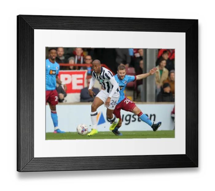 Framed Print : Intense Rivalry: Nadjim Abdou vs. Jamie Ness in the Sky Bet League One Playoff Semi-Final Clash at Scunthorpe United Framed Print : Intense Rivalry: Nadjim Abdou vs. Jamie Ness in the Sky Bet League One Playoff Semi-Final Clash at Scunthorpe United