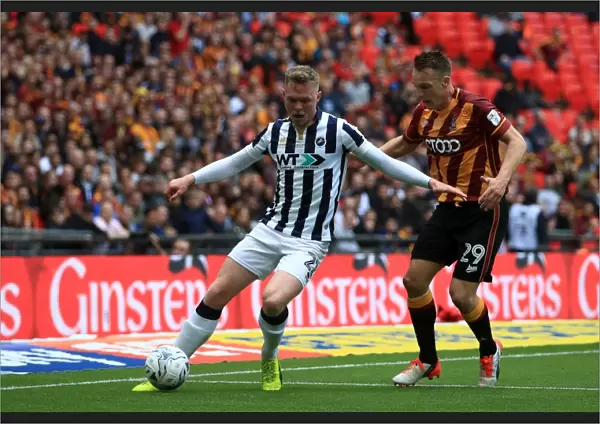 Bradford City vs Millwall - Intense Battle for the Ball in the Sky Bet League One Play-Off Final at Wembley Stadium