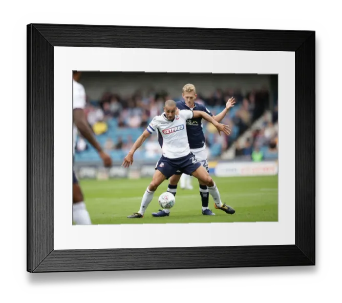 Framed Print : Battle for Supremacy: George Saville vs. Darren Pratley in Millwall vs. Bolton Wanderers, Sky Bet Championship Framed Print : Battle for Supremacy: George Saville vs. Darren Pratley in Millwall vs. Bolton Wanderers, Sky Bet Championship