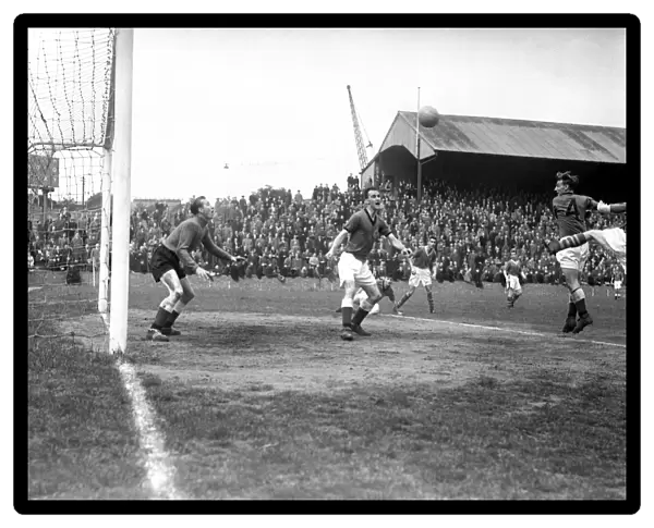 Millwall vs Plymouth Argyle: Shocking Moment as Millwall's Roy Summersby Scores a Header, Leaving Plymouth's Harold Brown and George Robertson in Disbelief