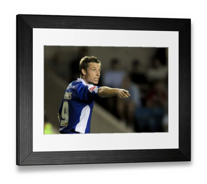 Framed Print : Millwall vs Oldham Athletic in Football League One at The New Den: Neil Harris Leads the Lions Framed Print : Millwall vs Oldham Athletic in Football League One at The New Den: Neil Harris Leads the Lions