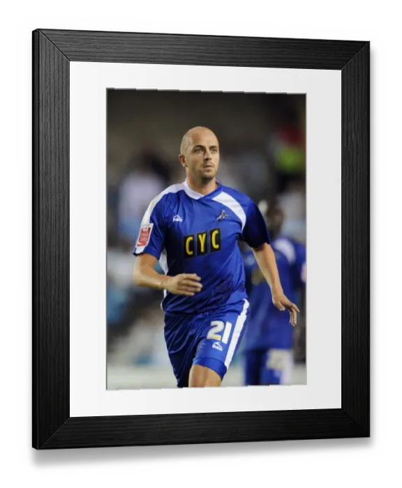 Framed Print : Intense Rivalry: Millwall vs Oldham Athletic in Football League One at The New Den (2009-2010 Season) Framed Print : Intense Rivalry: Millwall vs Oldham Athletic in Football League One at The New Den (2009-2010 Season)