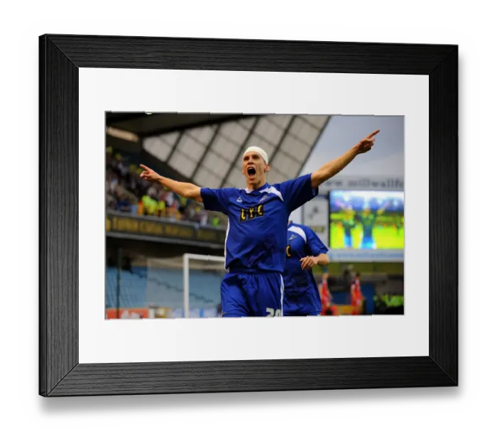 Framed Print : Milwall's Steve Morison Celebrates First Goal in Coca-Cola Football League One Play-Off Semi Final Second Leg against Huddersfield Town at The New Den Framed Print : Milwall's Steve Morison Celebrates First Goal in Coca-Cola Football League One Play-Off Semi Final Second Leg against Huddersfield Town at The New Den