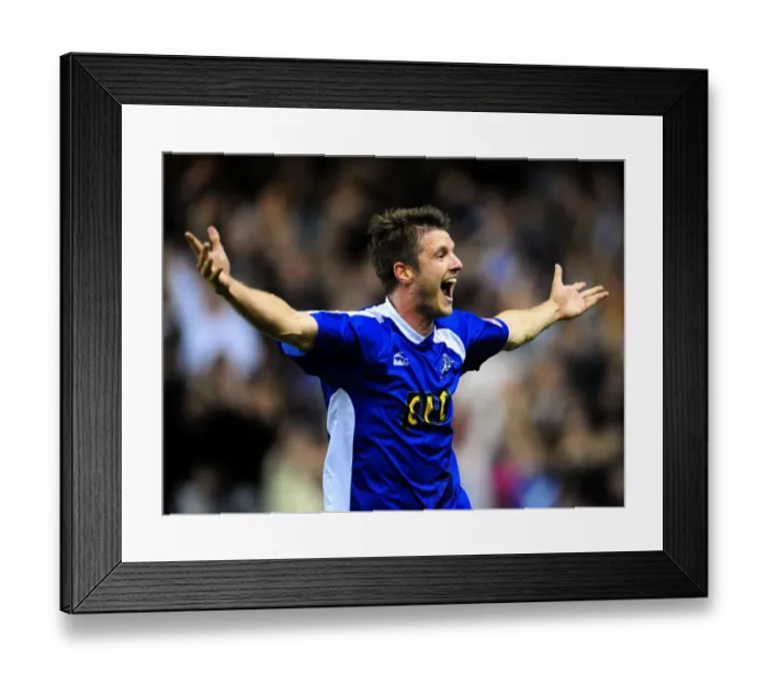 Framed Print : Milwall's Schofield Celebrates Dramatic Goal in Coca-Cola Football League One Play-Off Semi-Final vs. Huddersfield Town (The New Den) Framed Print : Milwall's Schofield Celebrates Dramatic Goal in Coca-Cola Football League One Play-Off Semi-Final vs. Huddersfield Town (The New Den)