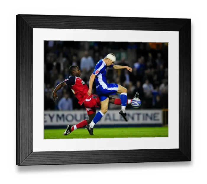 Framed Print : Intense Rivalry: Morison vs. Trotman in the Coca-Cola Football League One Play-Off Semi-Final - Milwall vs. Huddersfield Town (The New Den)