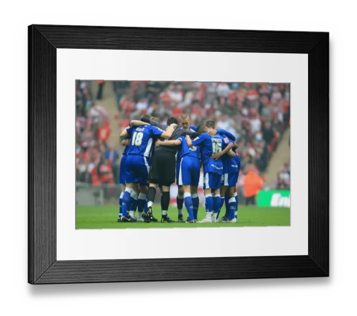 Framed Print : Millwall and Swindon Town Team Huddle before Wembley Stadium Play-Off Final in Football League One Framed Print : Millwall and Swindon Town Team Huddle before Wembley Stadium Play-Off Final in Football League One
