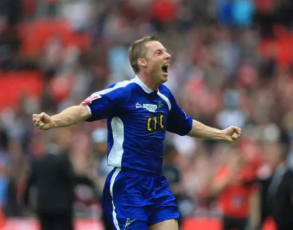 The Glory of Millwall: Neil Harris's Triumphant Celebration at Wembley after Securing Promotion to League One
