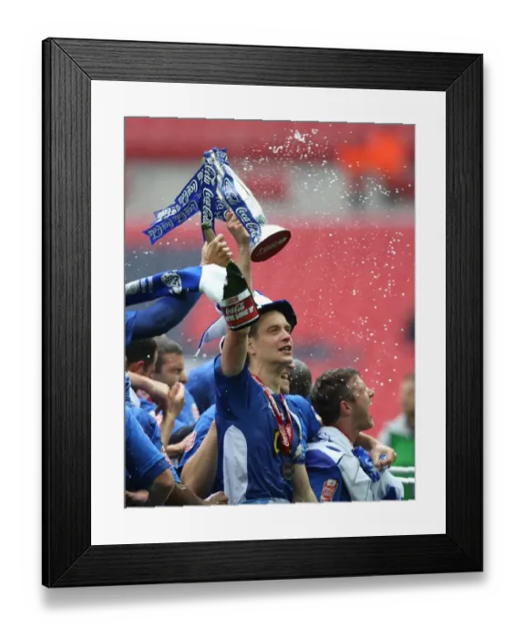 Framed Print : Millwall's Triumph: The Celebration at Wembley after Winning the Play-Off Final against Swindon Town in Football League One Framed Print : Millwall's Triumph: The Celebration at Wembley after Winning the Play-Off Final against Swindon Town in Football League One
