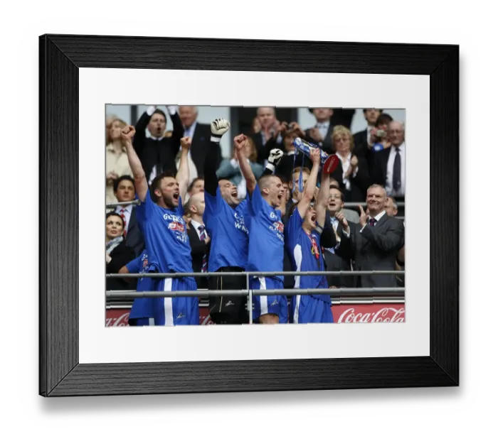 Framed Print : Millwall Football Club Celebrate Promotion to League One with Play-Off Final Win at Wembley (The Trophy Lift)
