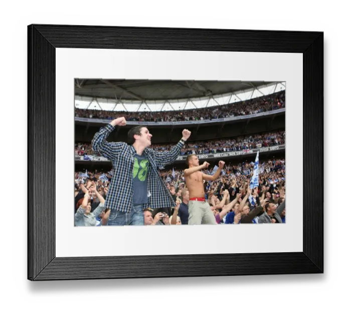 Framed Print : Millwall's Play-Off Triumph: The Fans Jubilant Celebration at Wembley (vs Swindon Town, Coca-Cola Football League One) Framed Print : Millwall's Play-Off Triumph: The Fans Jubilant Celebration at Wembley (vs Swindon Town, Coca-Cola Football League One)