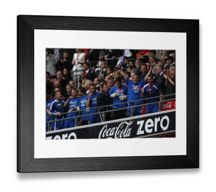 Framed Print : Millwall Football Club: Steve Morison Lifts the League One Play-Off Trophy at Wembley Stadium (The Triumphant Moment) Framed Print : Millwall Football Club: Steve Morison Lifts the League One Play-Off Trophy at Wembley Stadium (The Triumphant Moment)