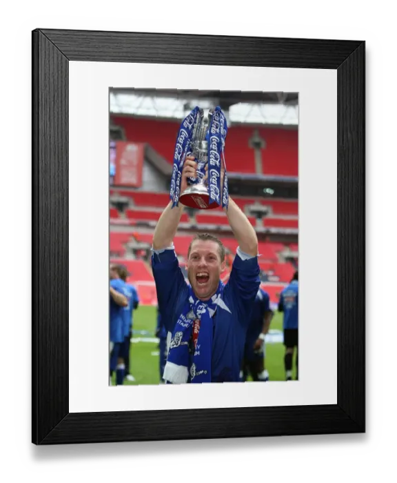 Framed Print : The Glory of Millwall: Neil Harris's Triumphant Wembley Victory with the League One Play-Off Trophy
