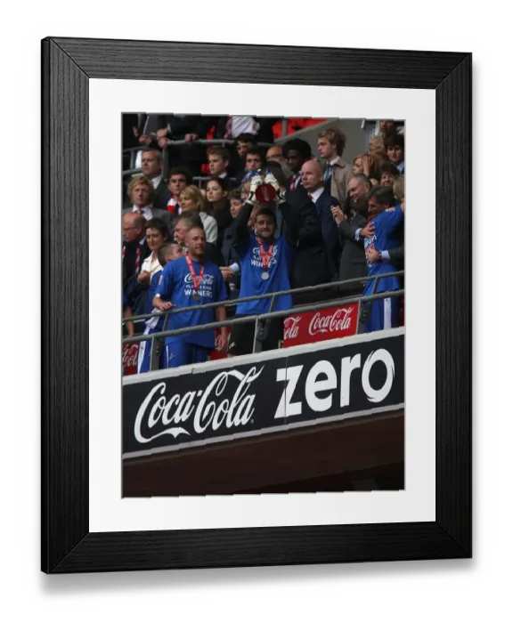 Framed Print : Millwall FC's John Sullivan Lifts the Promotion Trophy at Wembley Stadium Framed Print : Millwall FC's John Sullivan Lifts the Promotion Trophy at Wembley Stadium