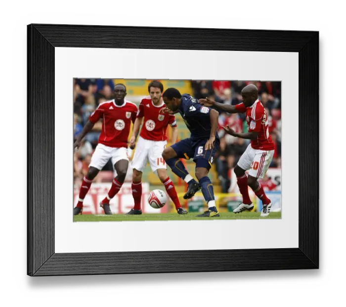 Framed Print : Battle for Supremacy: Liam Trotter vs. Jamal Campbell-Ryce in the Npower Championship Clash between Millwall and Bristol City (2010)
