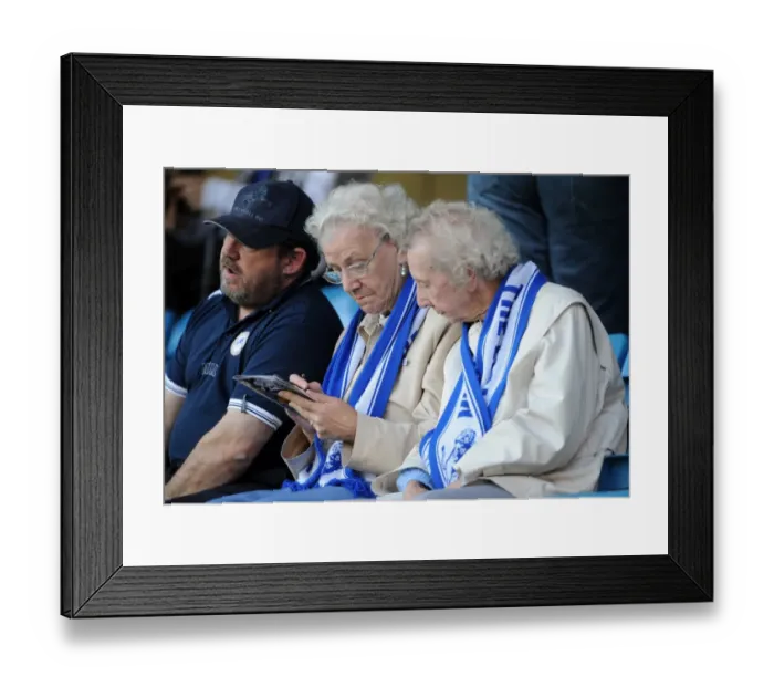 Framed Print : Millwall vs Middlesbrough in Carling Cup Second Round: A Sea of Passionate Fans at The New Den Framed Print : Millwall vs Middlesbrough in Carling Cup Second Round: A Sea of Passionate Fans at The New Den