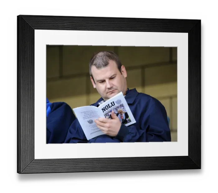 Framed Print : A Millwall Fan's Unforgettable Journey: Millwall vs Middlesbrough in Carling Cup Second Round at The New Den