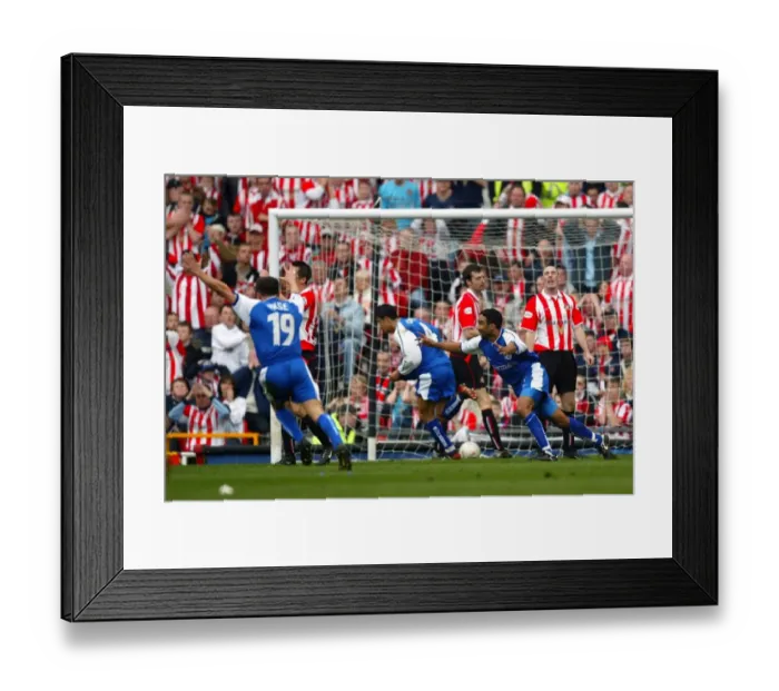 Framed Print : Millwall's Tim Cahill Scores the FA Cup Semi-Final Winning Goal Against Sunderland (2004) Framed Print : Millwall's Tim Cahill Scores the FA Cup Semi-Final Winning Goal Against Sunderland (2004)
