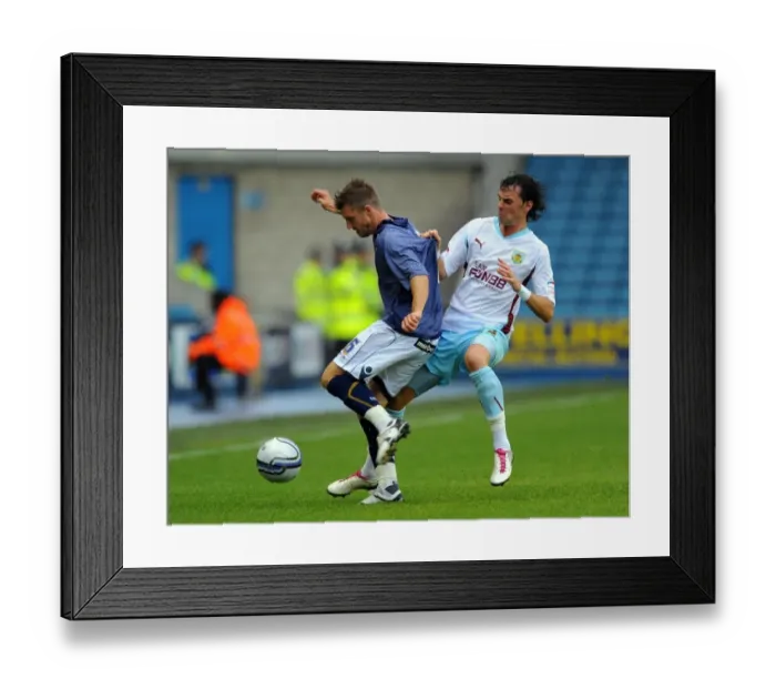 Framed Print : Battle for the Ball: Millwall vs. Burnley in the Npower Championship Framed Print : Battle for the Ball: Millwall vs. Burnley in the Npower Championship