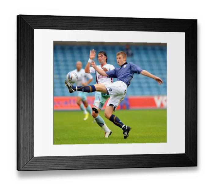 Framed Print : Battle for Supremacy: Millwall vs. Burnley in the Npower Championship