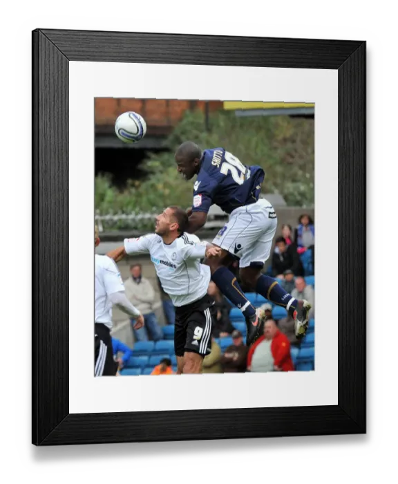 Framed Print : Millwall vs Derby County: A Battle at The New Den - Shittu vs Kuqi in Npower Championship Action Framed Print : Millwall vs Derby County: A Battle at The New Den - Shittu vs Kuqi in Npower Championship Action