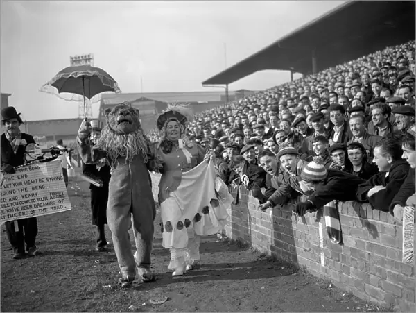 Vintage FA Cup Rivalry: Millwall Lion vs. Birmingham Lady at The Den - Fifth Round Showdown