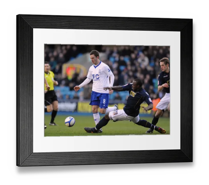 Framed Print : Millwall vs Birmingham City: A Battle for FA Cup Possession - Danny Shittu vs Craig Gardner (January 2011) Framed Print : Millwall vs Birmingham City: A Battle for FA Cup Possession - Danny Shittu vs Craig Gardner (January 2011)