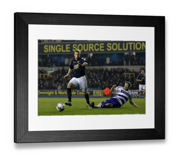 Framed Print : Neil Harris Escapes Gorkss Grasp: Millwall vs. Queens Park Rangers in Npower Championship Action (08-03-2011, The New Den)